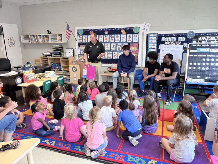 Mr. Moulin talks with the kids 