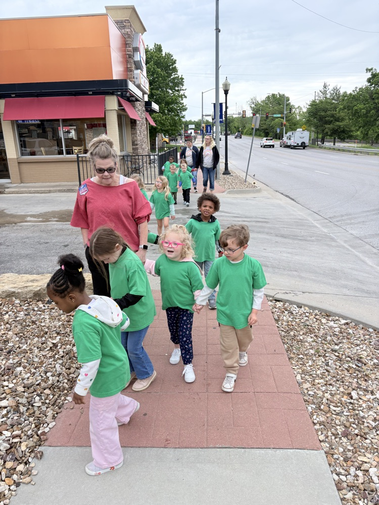 children walking past Dairy Queen