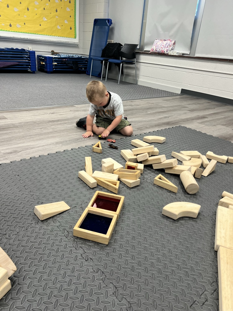 wooden blocks, ramps and cars
