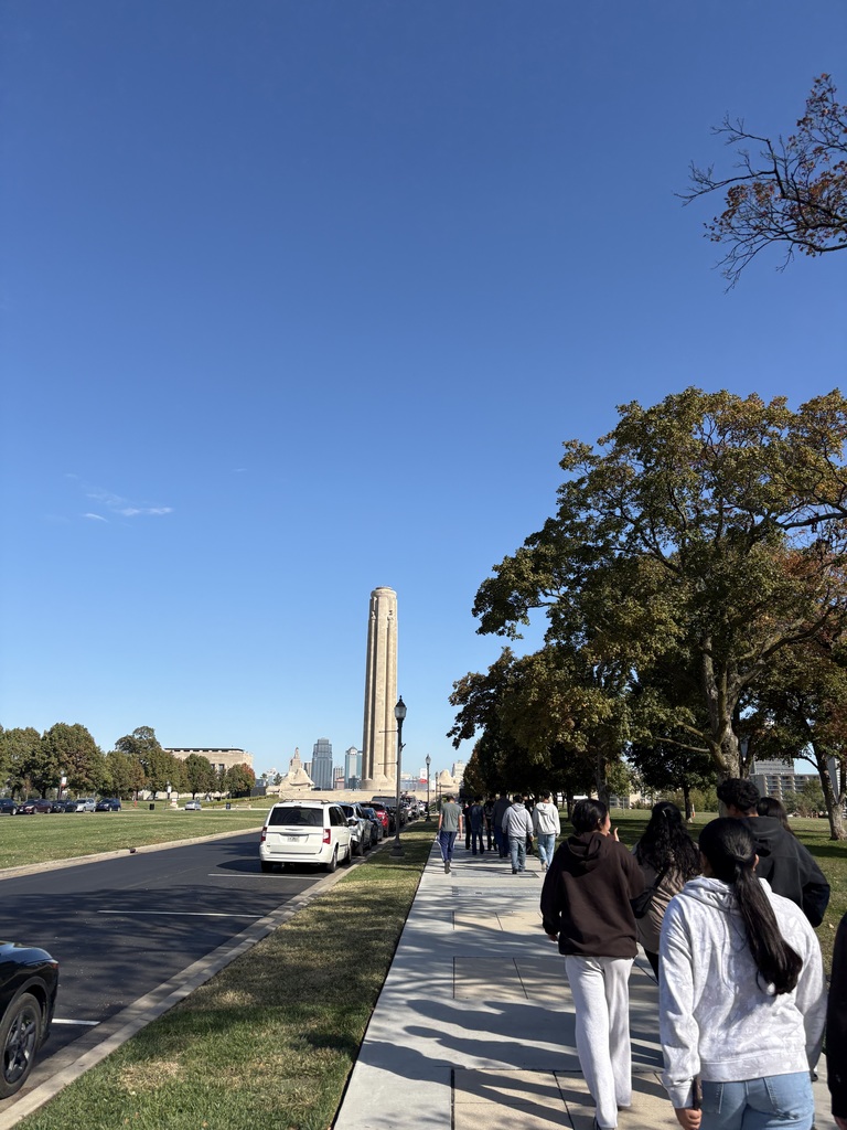 student walking down a side walk