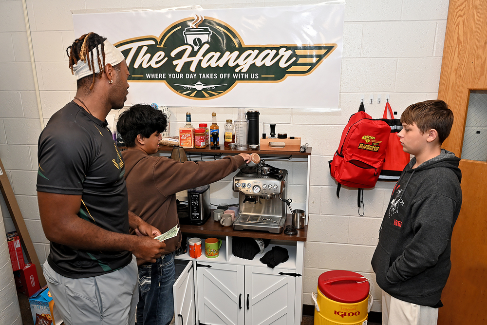 three people making coffee