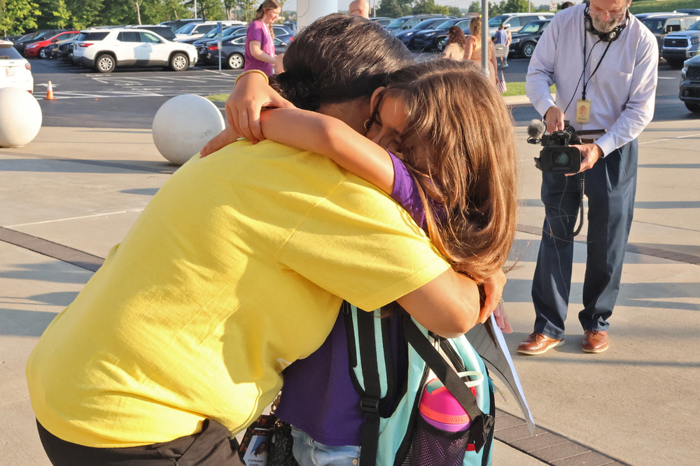 student hug