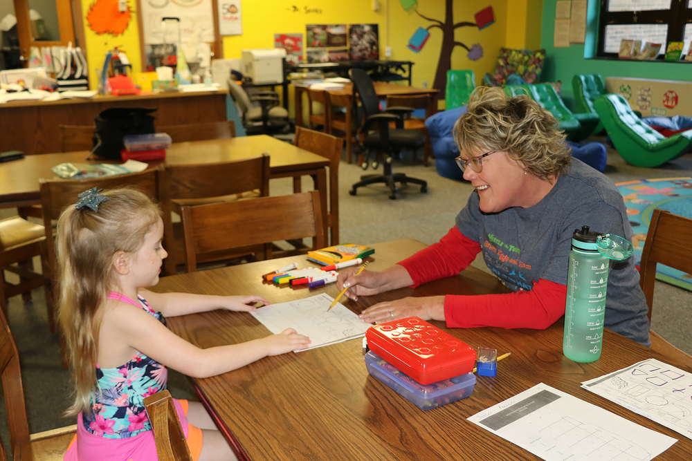 student with teacher