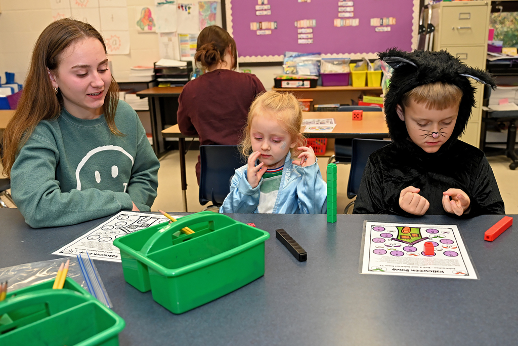 kids in costumes playing games