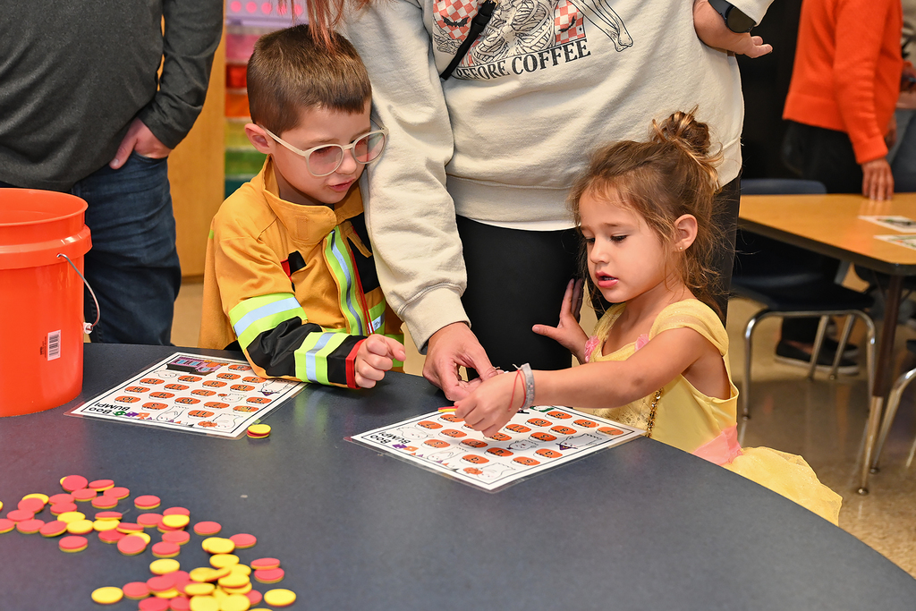 kids in costumes playing games