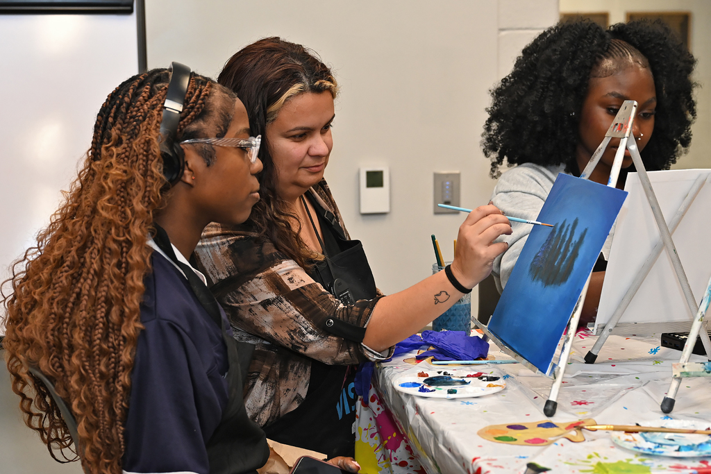 students painting