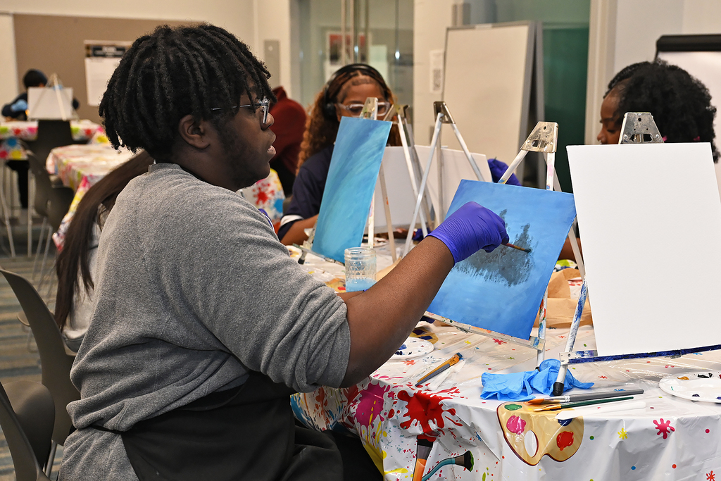 students painting