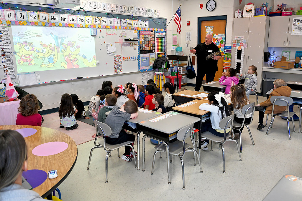 author reading to students