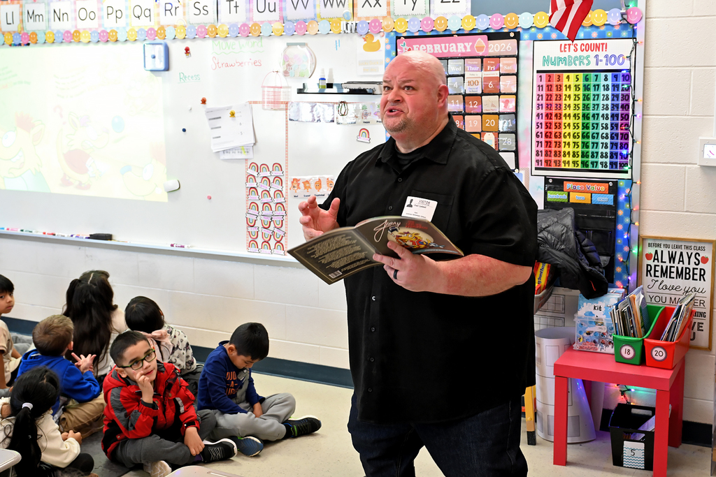 author reading to students