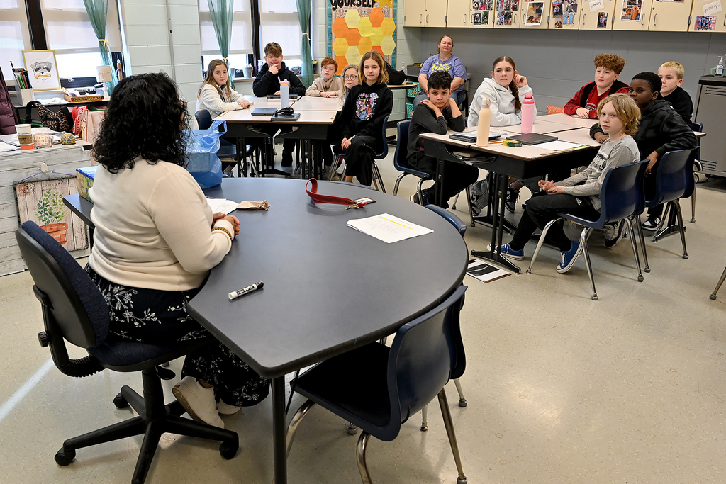 students listening to presentation