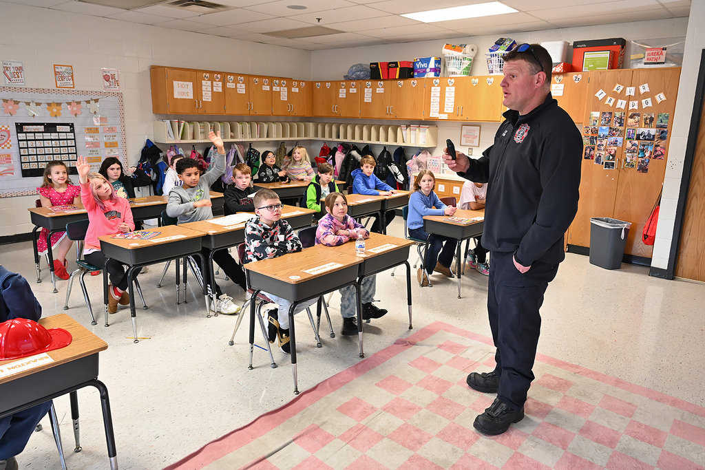 students listening to presentation