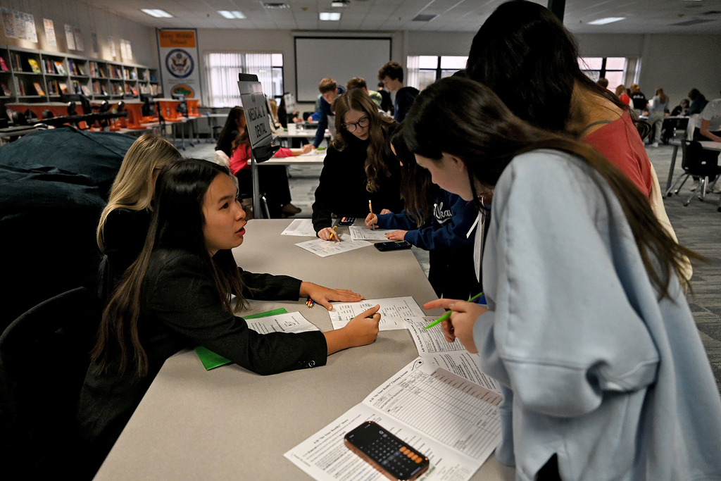 students working around table