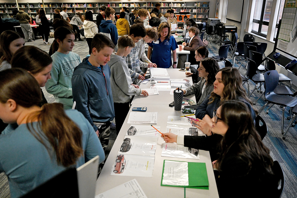 students working around table