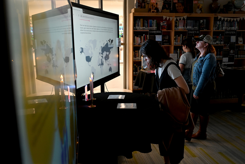 community memebrs at Anne Frank exhibit