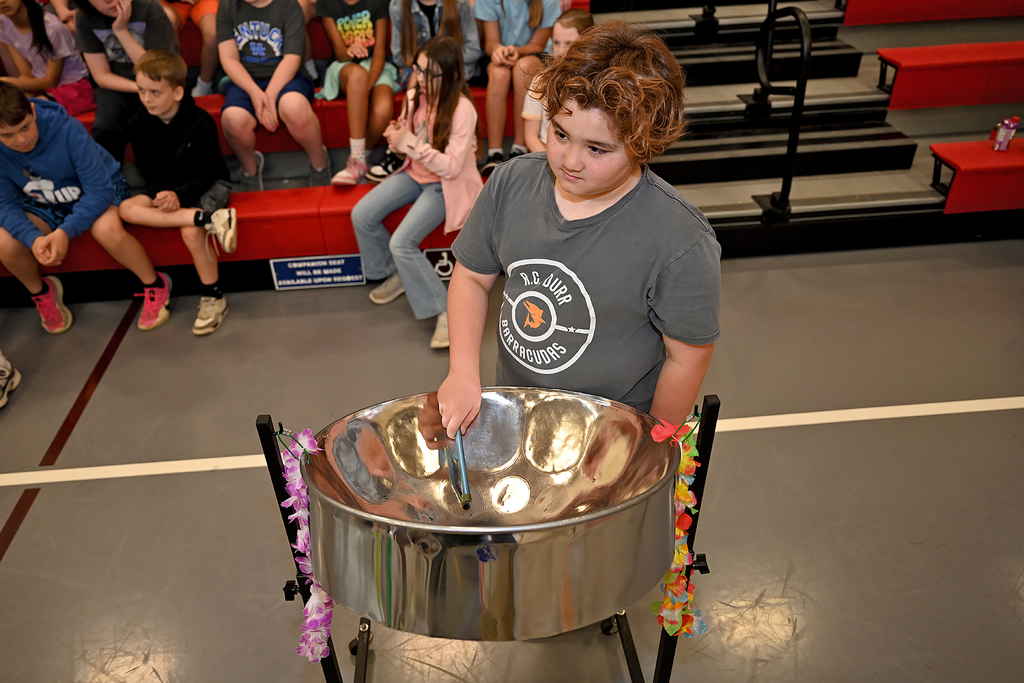 student playing steel drums