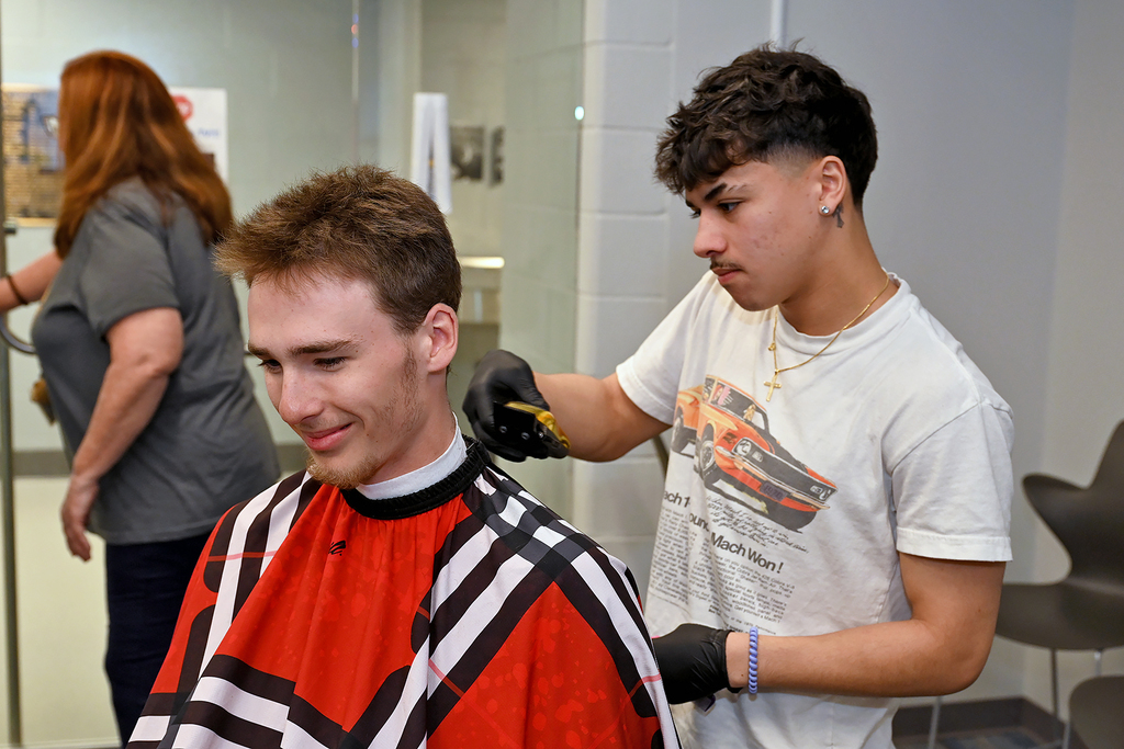student with a barber