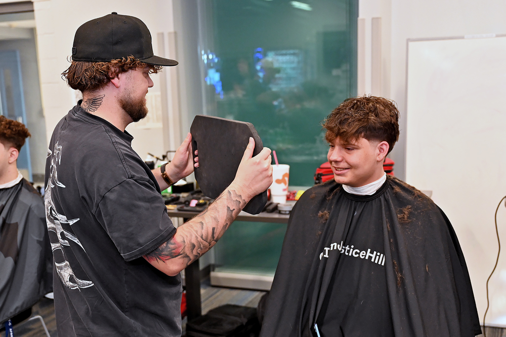 student with barber