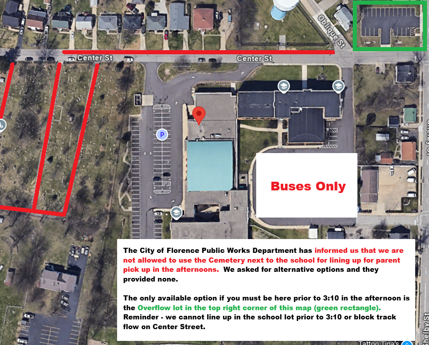 Map with overhead view of school campus. Red line marks area where buses are only allowed. Green line shows cemetery location.