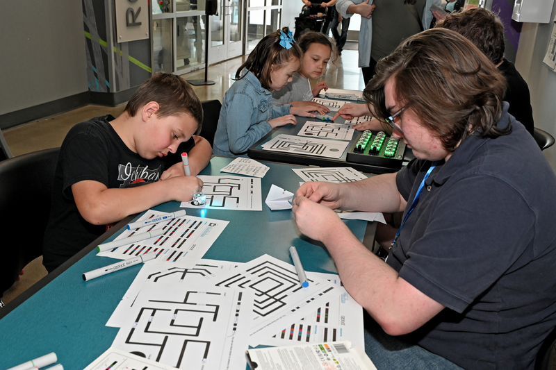 students working on robot