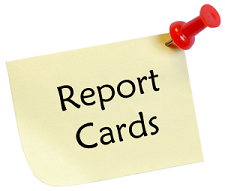 A sign that says report card with thumbtack in the corner