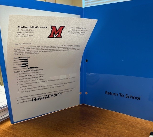 Picture of a blue communication student folder. 