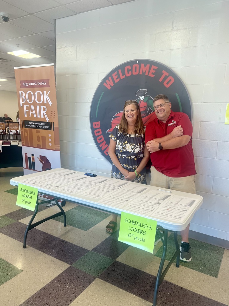 Staff helping at middle school open house night