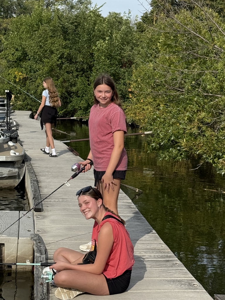 7th graders fishing from a dock
