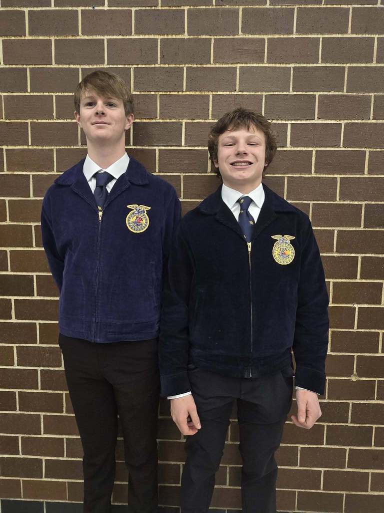 Two students who served as voting delegates for the Boone A & M FFA Chapter
