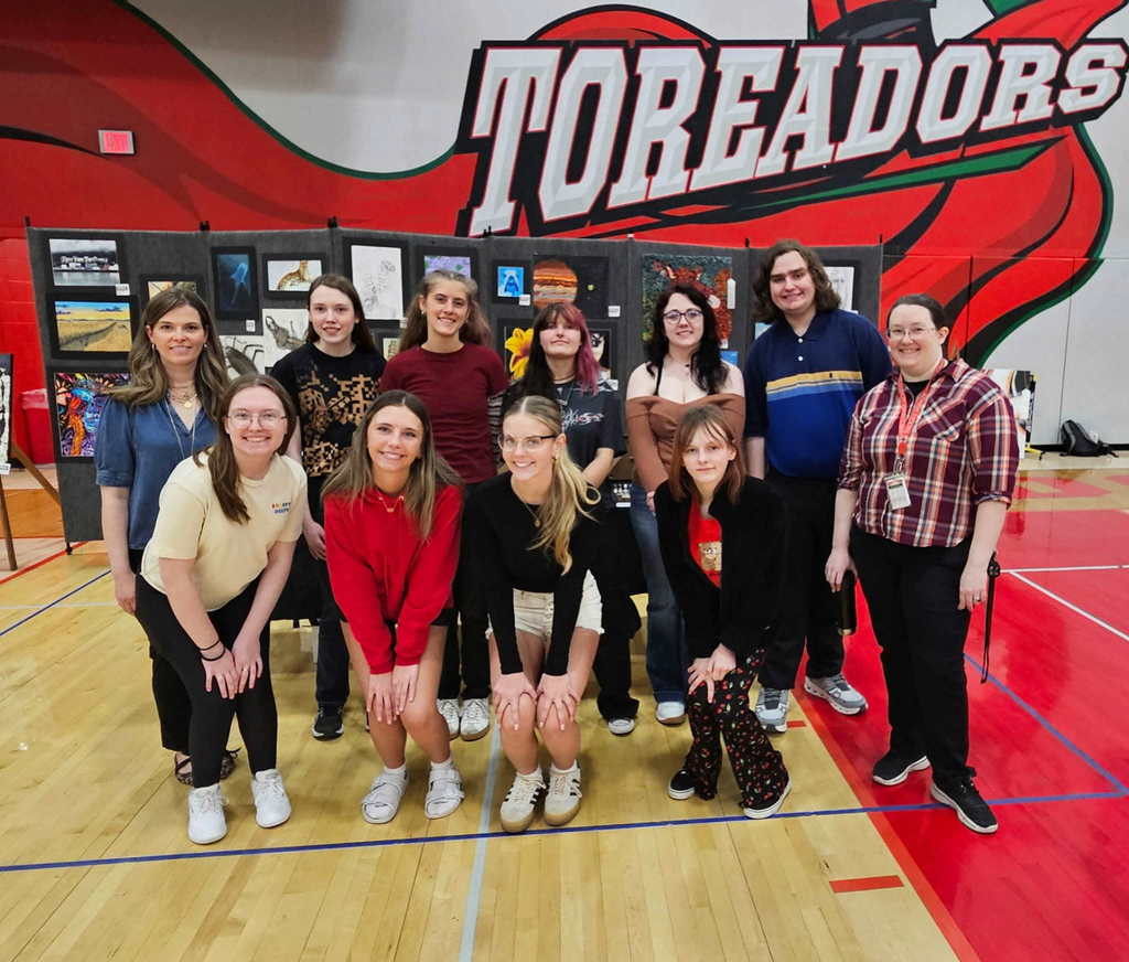 Group of people from Boone CSD posed for a group photo at the art show.