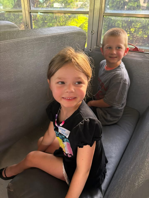 students ride the bus