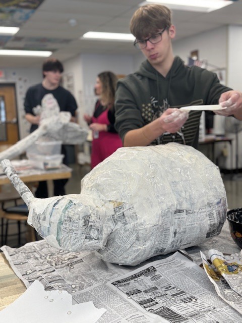 new layer of paper mache