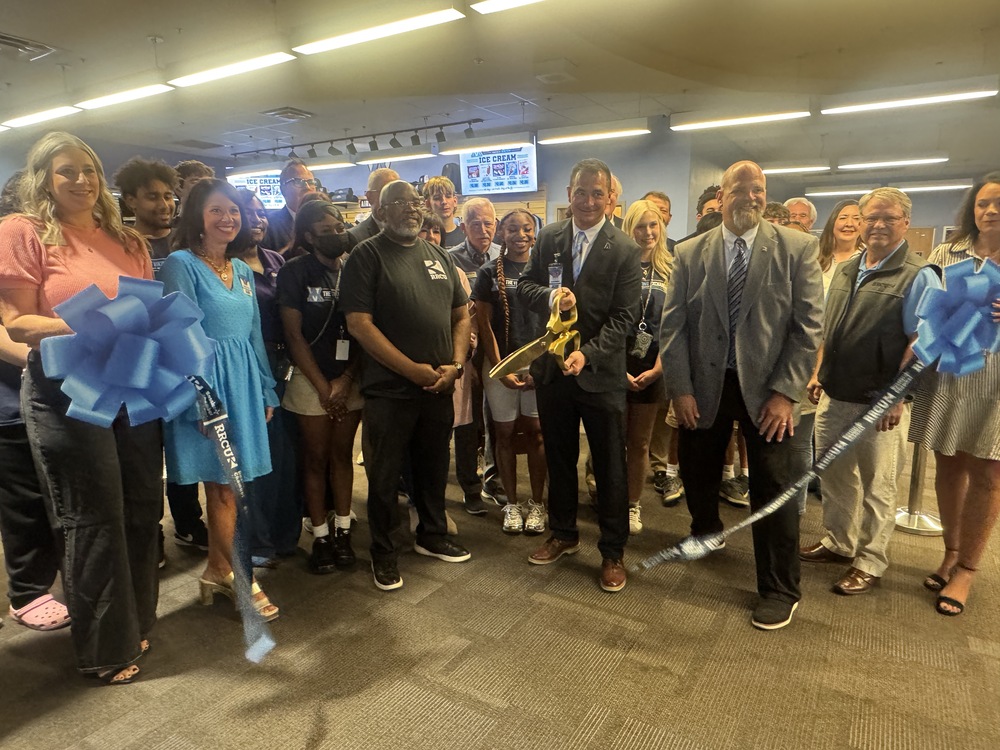 Airline High School holds a ribbon cutting in front of its student-run store called the Viking Exchange