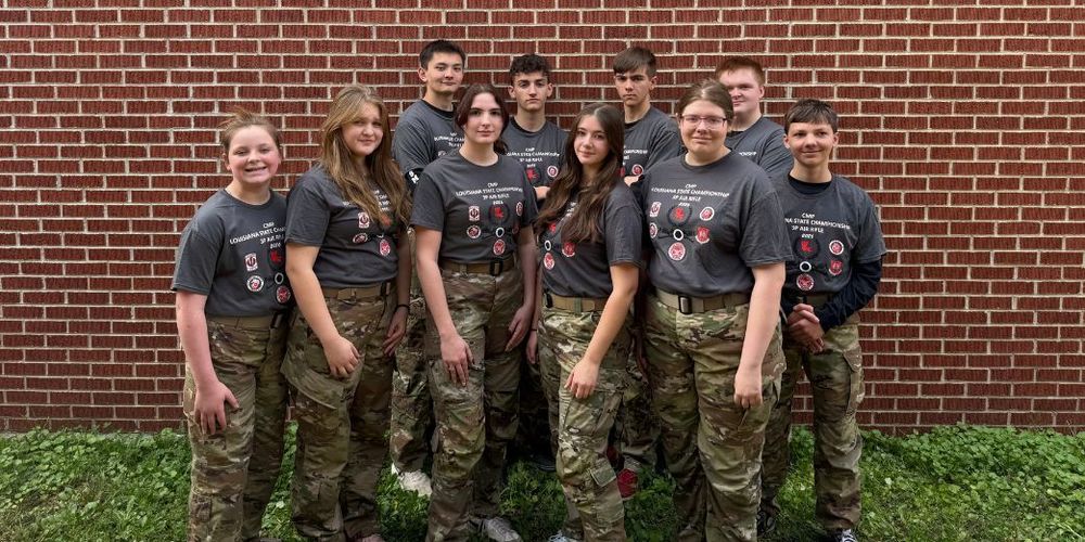 Group photo of 10 cadets from Haughton High Marksmanship Team