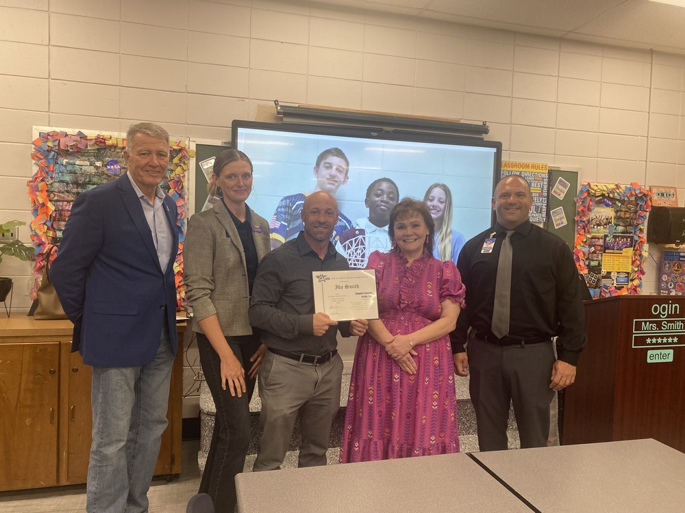 Photo of Ida Smith accepting a certificate