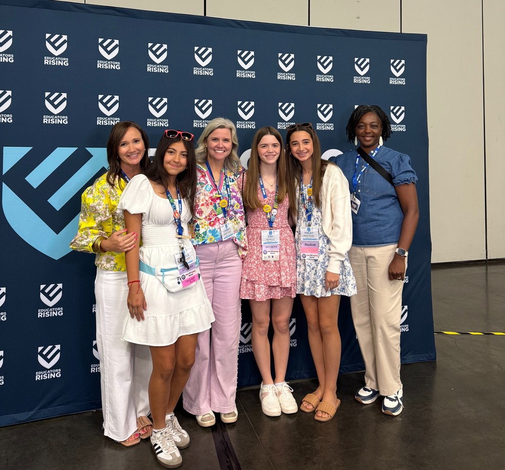 Group photo of students Kinley Johnson, Eva Salter and Angele Gutierrez with their sponsors