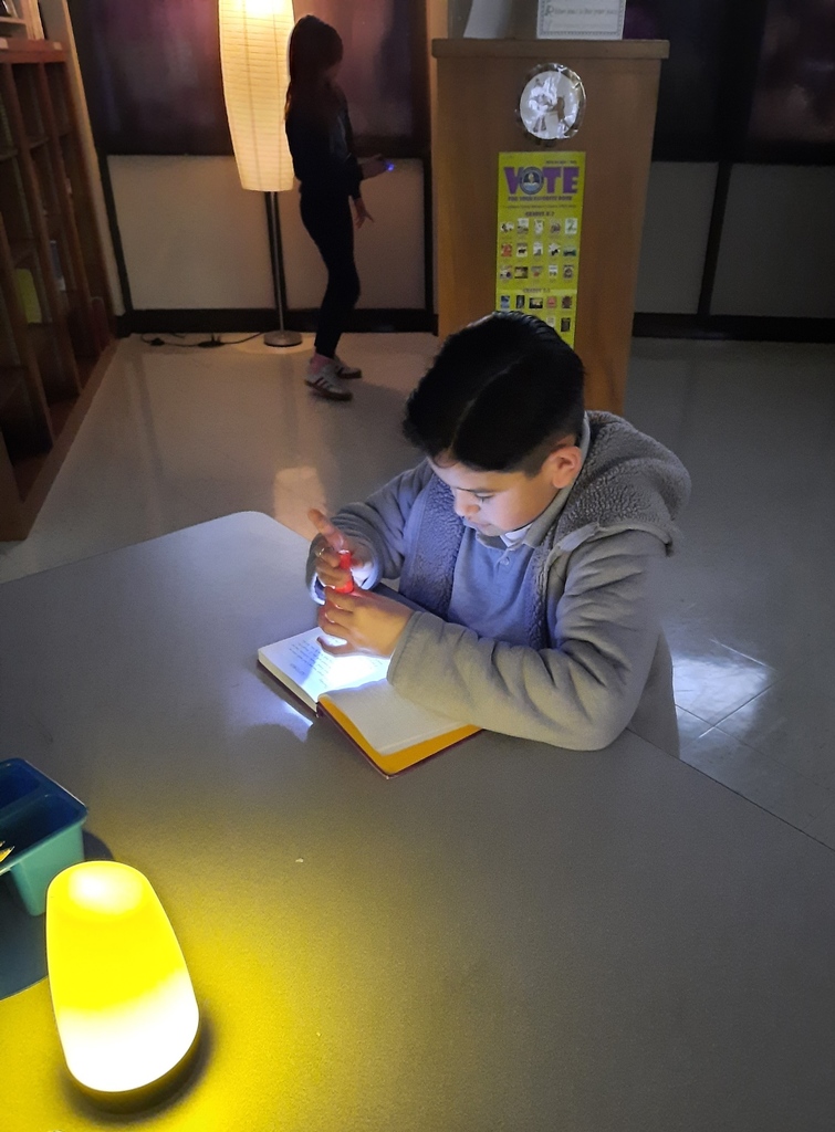 Reading Makes Us Happy Campers!