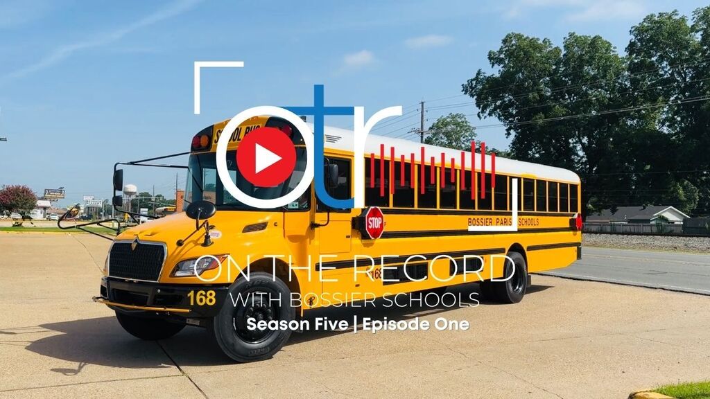 On The Record with Bossier Schools Logo overlay on top of photo of Bossier School bus