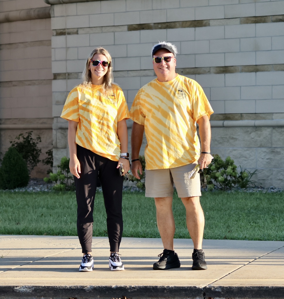Coach Foote and Mr. Chamernik wearing their tye dye shirts and glasses