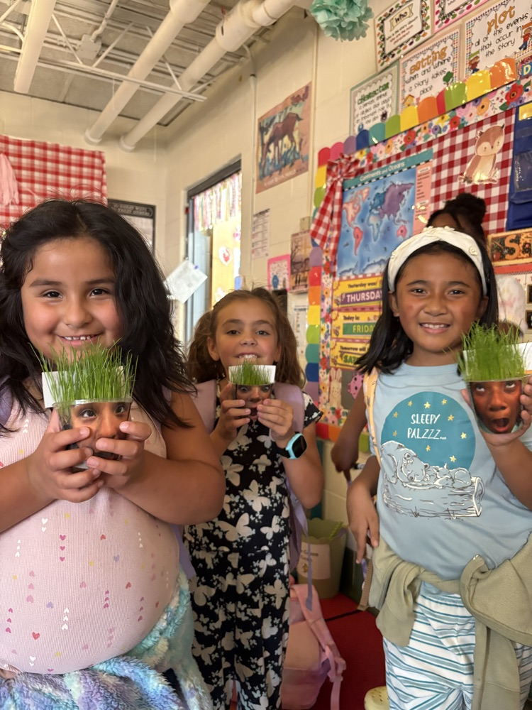 3 students with their cups 