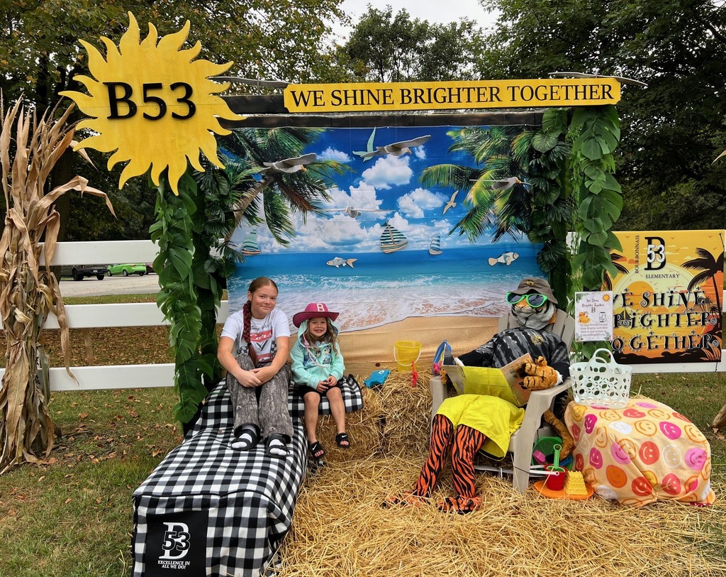 Emersyn and Brooklyn at the tiger scarecrow 