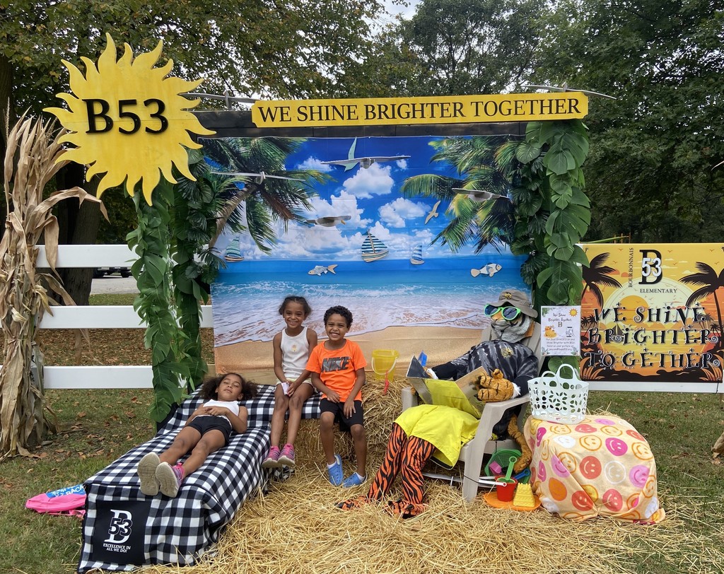 3 students at the scarecrow festival 