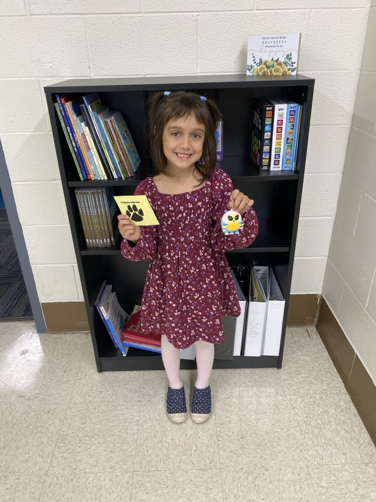 student with golden Tiger paw and prize 