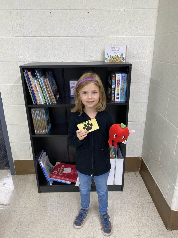 student with golden Tiger paw and prize 