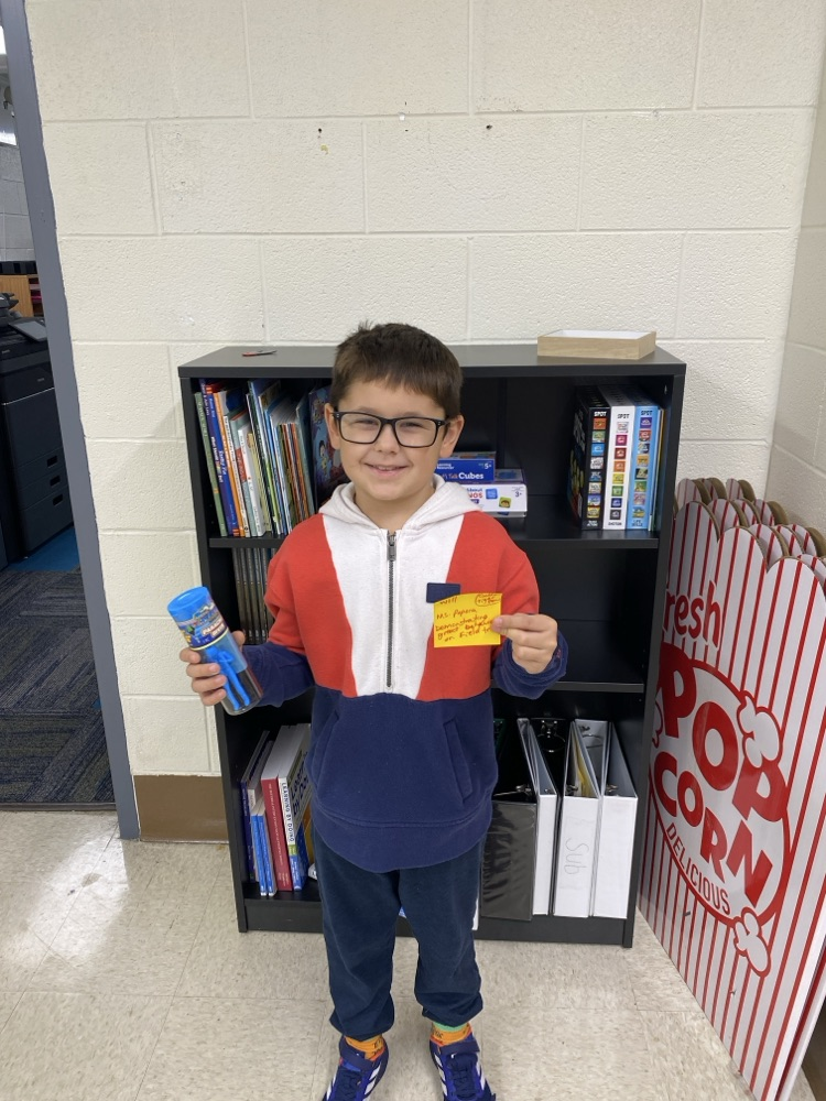 student with golden Tiger prize