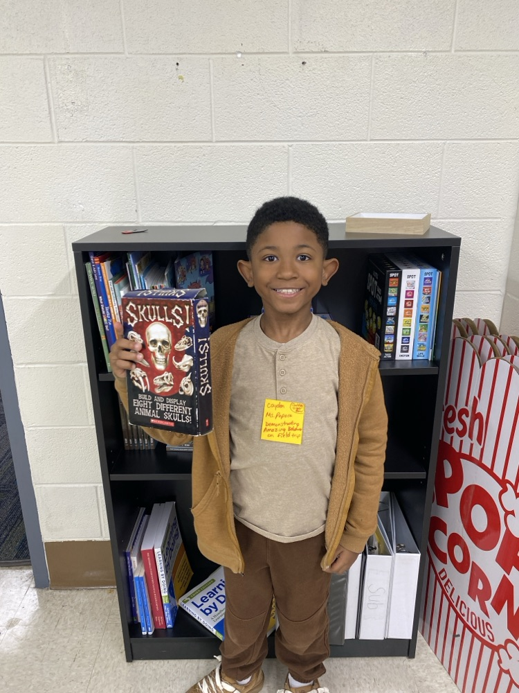 student with golden Tiger prize