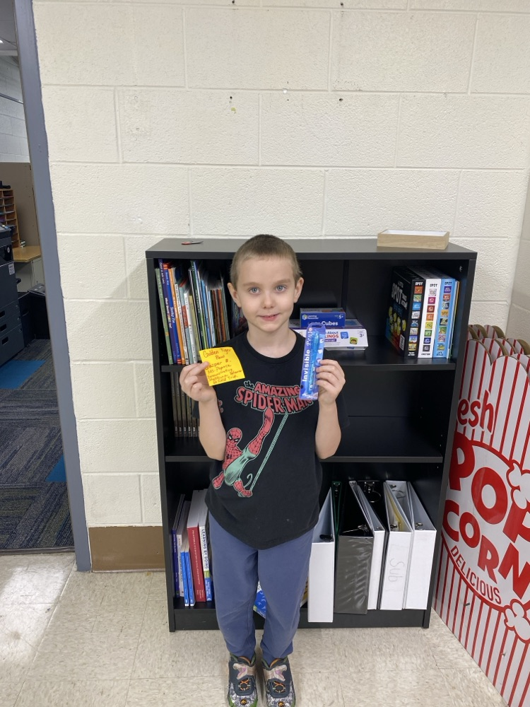 student with golden Tiger prize