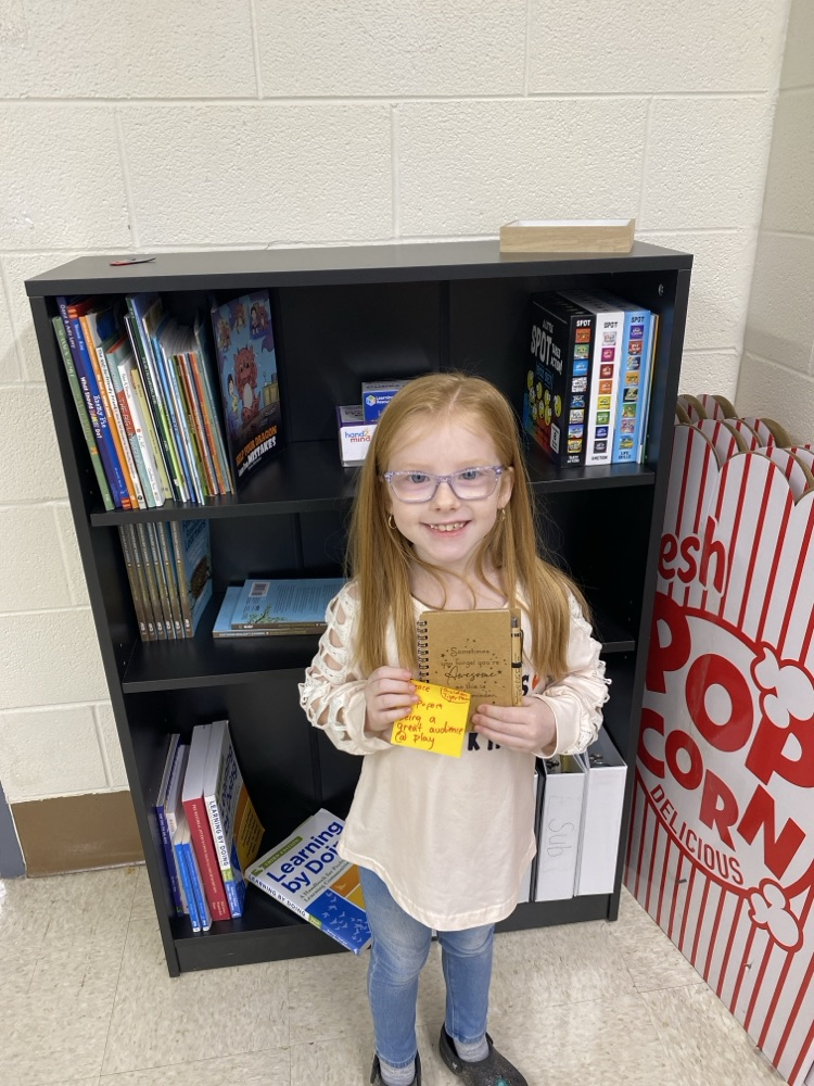 student with golden Tiger prize