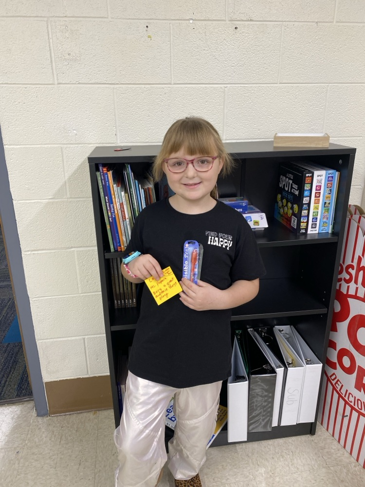 student with golden Tiger prize
