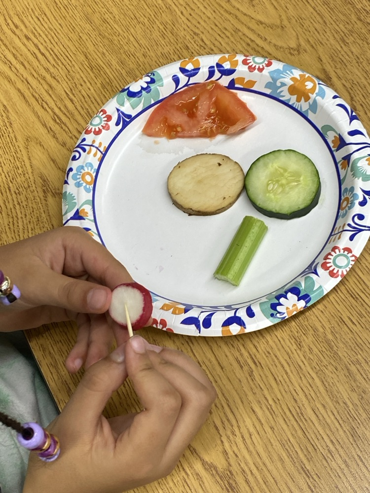 student with a radish 