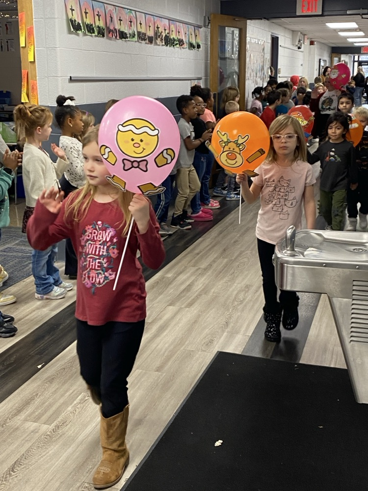 student with balloon